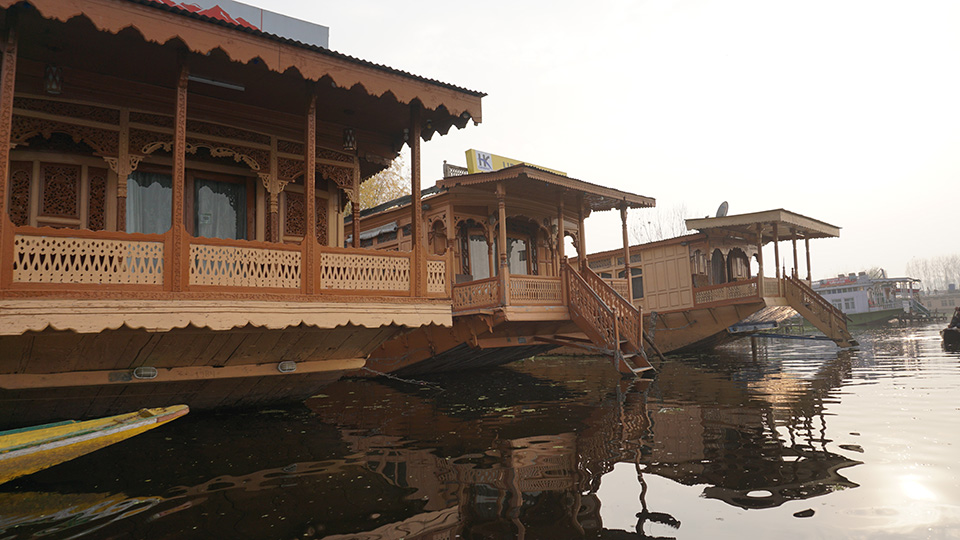 image of house boat in open lake