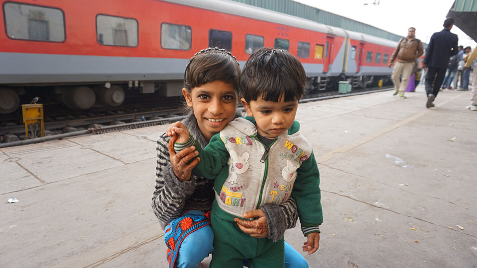 Image of the kids at the train station